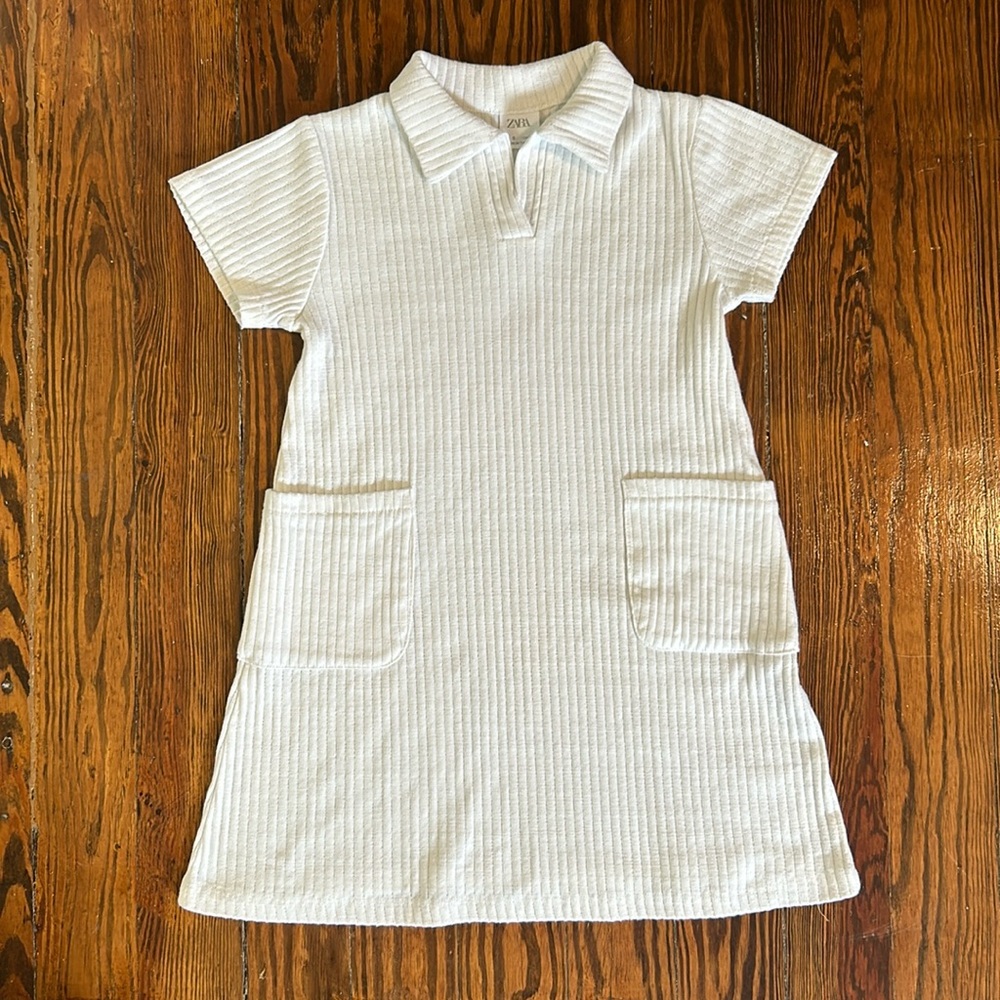 Girls Zara size 9 white collared tennis dress with pocket details.